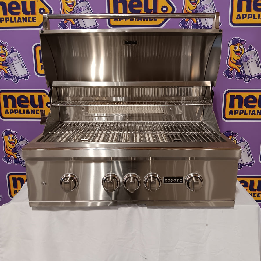 Coyote 36 Inch Built-In Grill with 3 Infinity Burners™, RapidSear™ Infrared Burner, 875 sq. in. Cooking Surface, Interior Grill Lighting, LED Illuminated Knobs, and Integrated Wind Guard C2SL36NG - Scratch & Dent (Moderate)