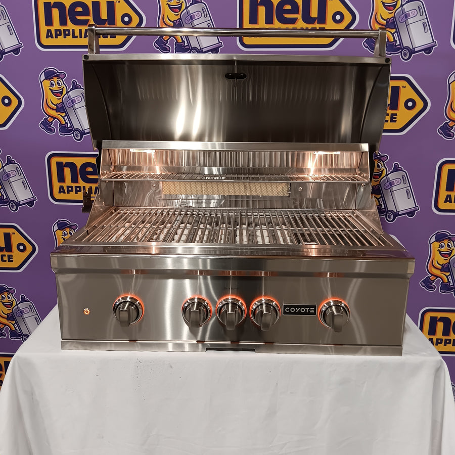 Coyote 36 Inch Built-In Grill with 3 Infinity Burners™, RapidSear™ Infrared Burner, 875 sq. in. Cooking Surface, Interior Grill Lighting, LED Illuminated Knobs, and Integrated Wind Guard C2SL36NG - Scratch & Dent (Minor)