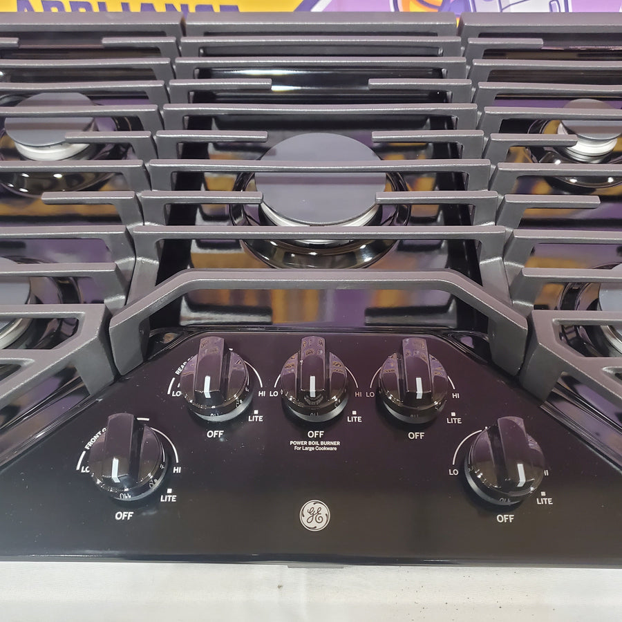 GE 30 in. Gas Cooktop in Black with 5-Burners including Power Burners JGP5030DLBB - Open Box