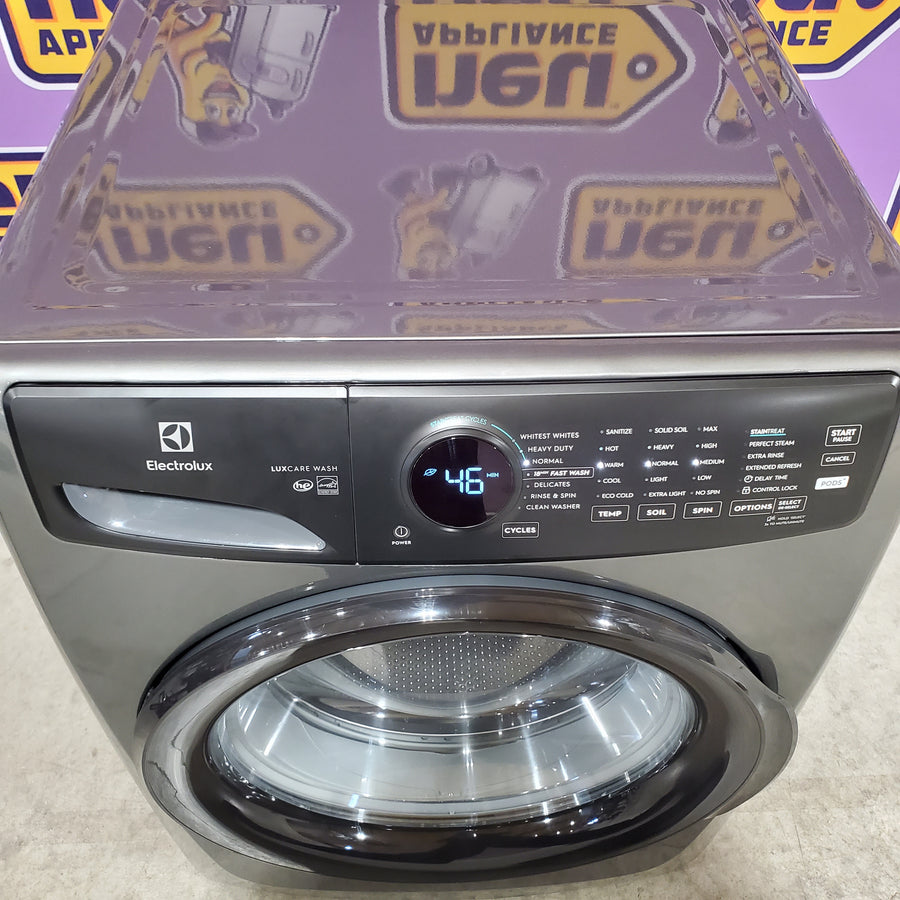 Electrolux 400 Series Front Load Washer - 4.5 Cu. Ft. ELFW7437AT - Scratch & Dent (Minor) and Electrolux 8-cu ft Stackable Vented Electric Dryer with Steam Cycle in Titanium ELFE7437AT - Scratch & Dent (Moderate)
