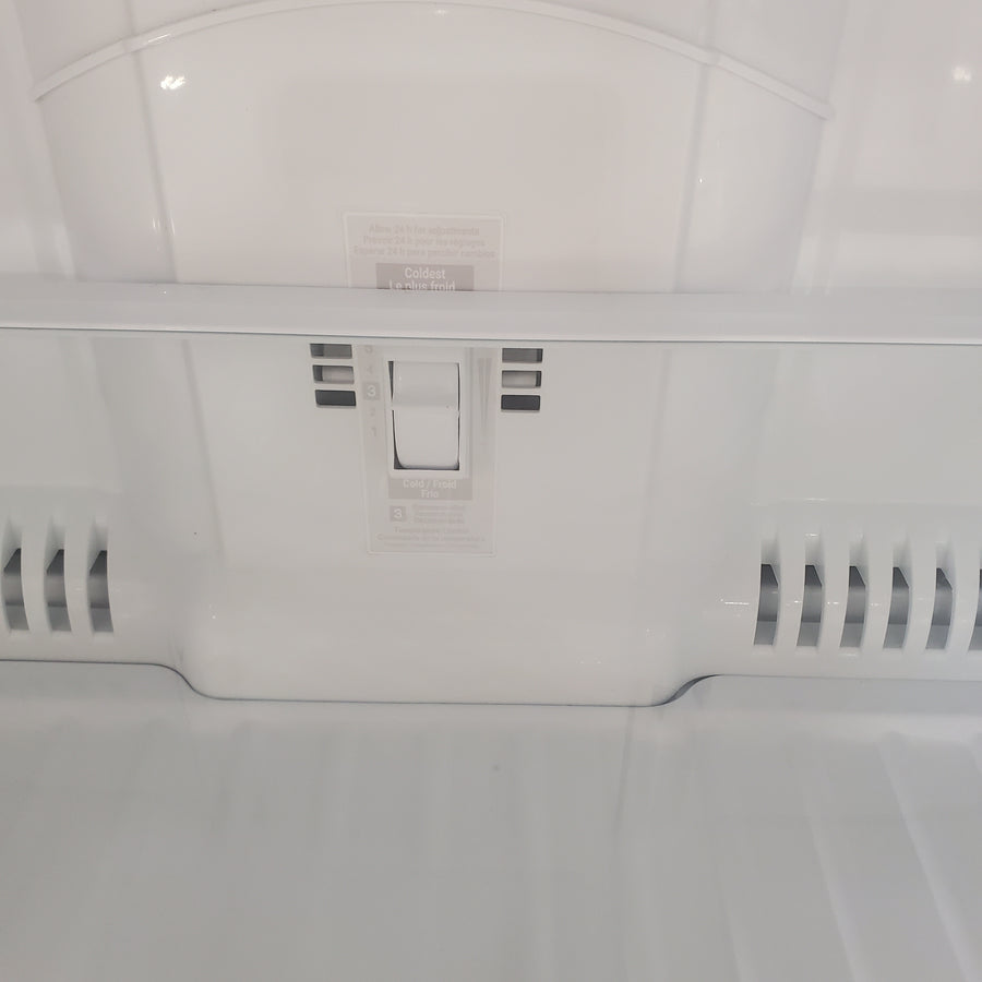 LG 33" Wide 24 cu ft Top Freezer Refrigerator with Internal Water Dispenser and LED Lighting LRTLS2403S - Scratch & Dent (Minor)