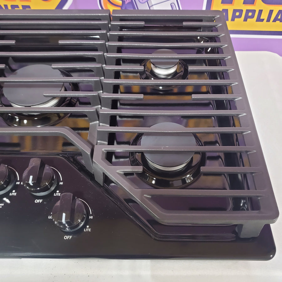 GE 30 in. Gas Cooktop in Black with 5-Burners including Power Burners JGP5030DLBB - Open Box
