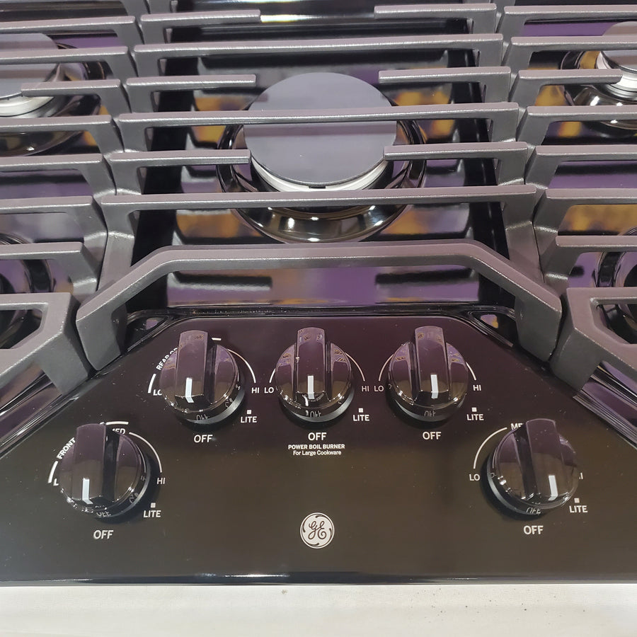 GE 30 in. Gas Cooktop in Black with 5-Burners including Power Burners JGP5030DLBB - Open Box