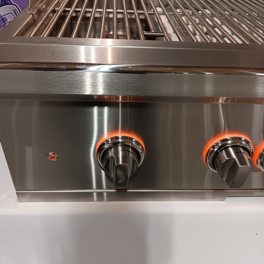 Coyote 36 Inch Built-In Grill with 3 Infinity Burners™, RapidSear™ Infrared Burner, 875 sq. in. Cooking Surface, Interior Grill Lighting, LED Illuminated Knobs, and Integrated Wind Guard C2SL36NG - Scratch & Dent (Moderate)