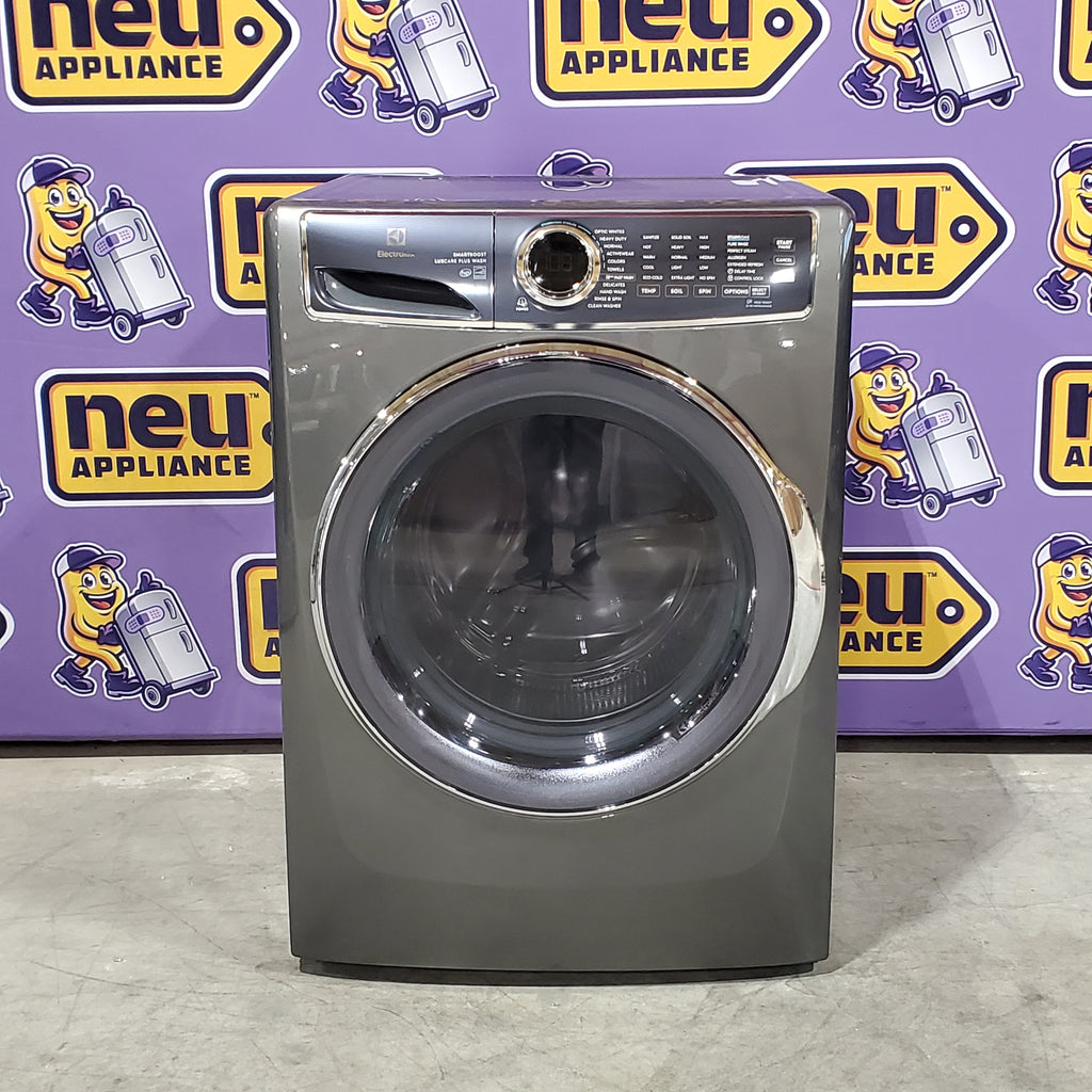 Electrolux Titanium Front Load 600 Series 4.5 Cu. Ft. Washer with Smartboost ELFW7637AT - Scratch & Dent (Minor) and Electrolux 8 cu. ft. vented Front Load Stackable 600 Series Electric Dryer with LuxCare Dry 16098 - ELFE7637AT - Scratch & Dent (Moderate)