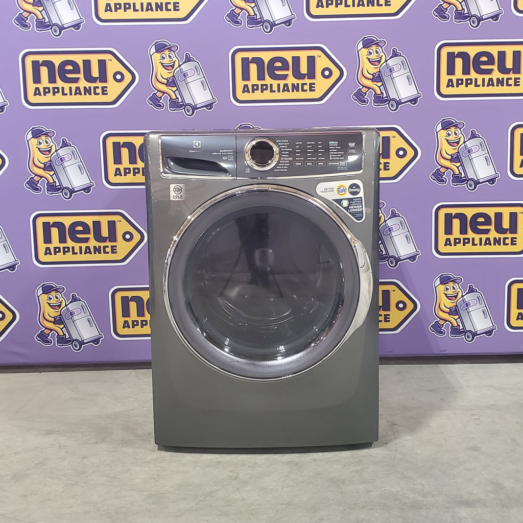 Pictures of Electrolux Titanium Front Load 600 Series 4.5 Cu. Ft. Washer with Smartboost ELFW7637AT - Scratch & Dent (Minor) and Electrolux 8 cu. ft. vented Front Load Stackable 600 Series Electric Dryer in Titanium with LuxCare Dry 16032 - ELFE7637AT - New in Box - Neu Appliance Outlet - Discount Appliance Outlet in Austin, Tx