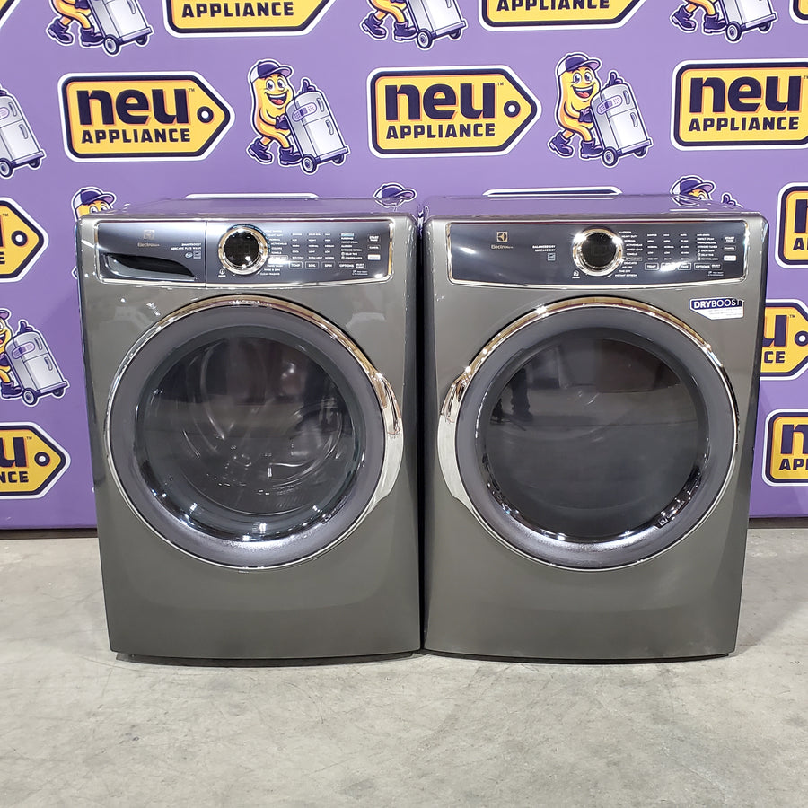 Electrolux Titanium Front Load 600 Series 4.5 Cu. Ft. Washer with Smartboost ELFW7637AT - Scratch & Dent (Minor) and Electrolux 8 cu. ft. vented Front Load Stackable 600 Series Electric Dryer with LuxCare Dry 16098 - ELFE7637AT - Scratch & Dent (Moderate)