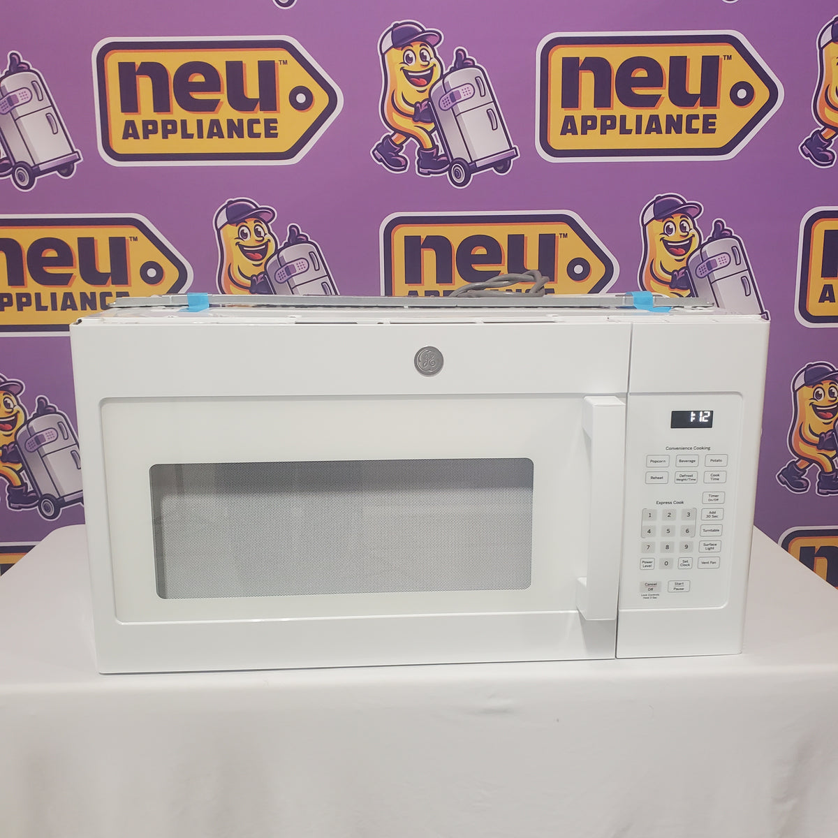 GE 1.6 cu. ft. Over the Range Microwave in White with 13.5 inch Defrost Options JVM3160DFWW - Scratch & Dent (Minor)