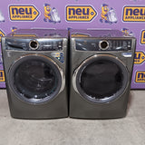 Electrolux Titanium Front Load 600 Series 4.5 Cu. Ft. Washer with Smartboost ELFW7637AT - Scratch & Dent (Moderate) and Electrolux 8 cu. ft. vented Front Load Stackable 600 Series Electric Dryer with LuxCare Dry 16248 - ELFE7637AT - Scratch & Dent (Minor)