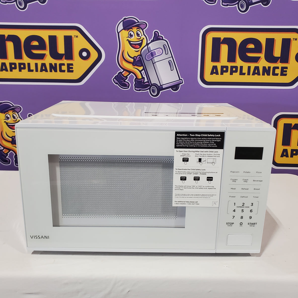 Vissani 1.1 cu. ft. Electric 1000-W Countertop Microwave in White with Turntable, 6-Heating Functions, and 2-Step Lock System E30PXP02-WHT - Scratch & Dent (Minor)