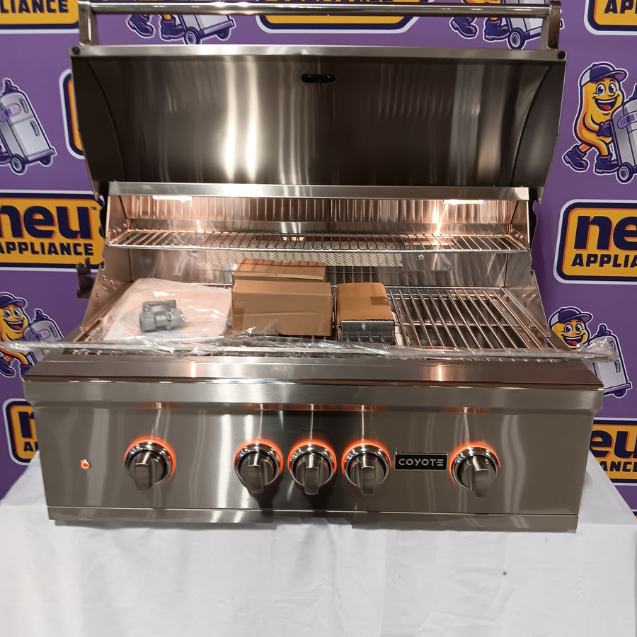 Coyote 36 Inch Built-In Grill with 3 Infinity Burners™, RapidSear™ Infrared Burner, 875 sq. in. Cooking Surface, Interior Grill Lighting, LED Illuminated Knobs, and Integrated Wind Guard C2SL36NG - Scratch & Dent (Moderate)