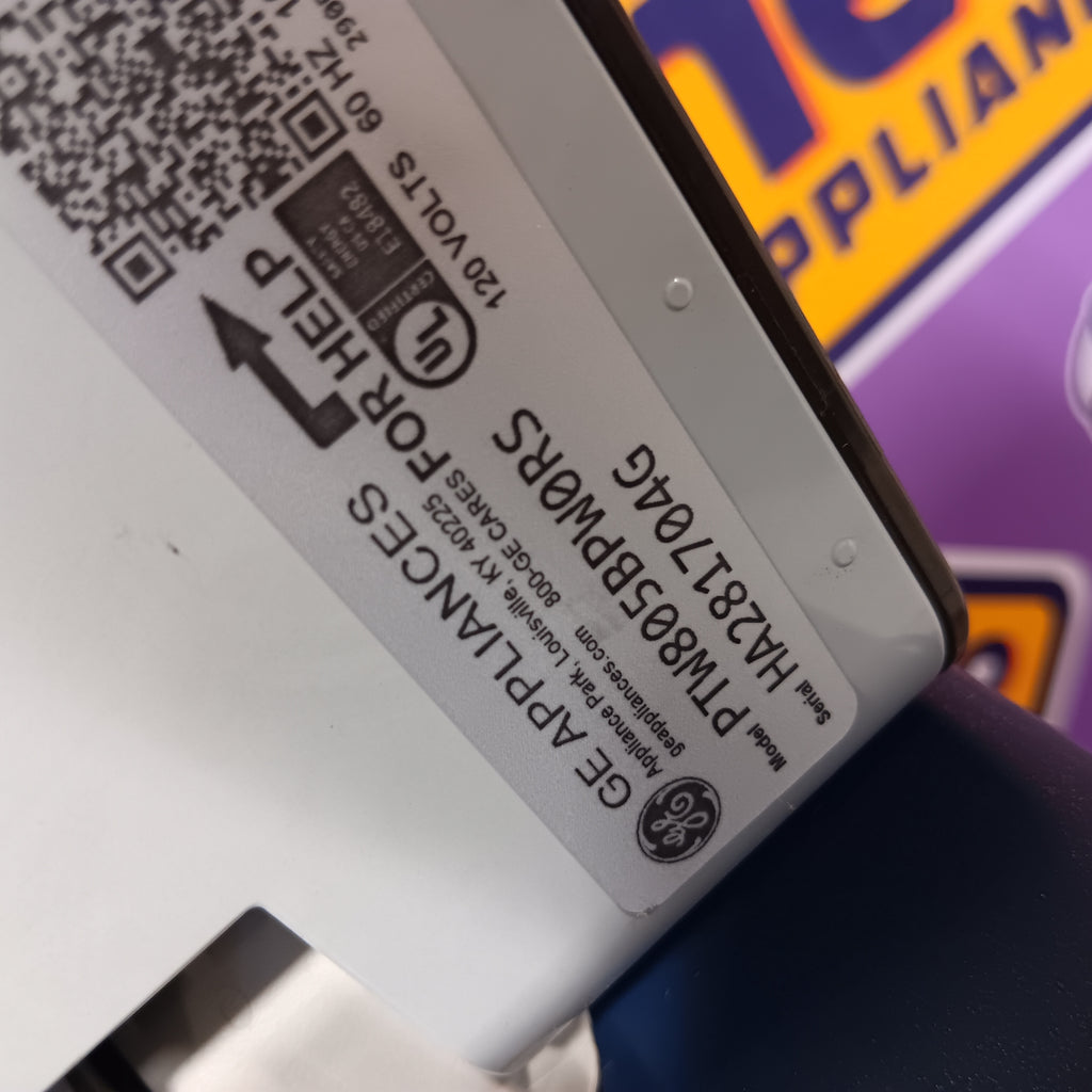 GE PTW805BPWRS Close-up of a GE appliance label with a blurred background