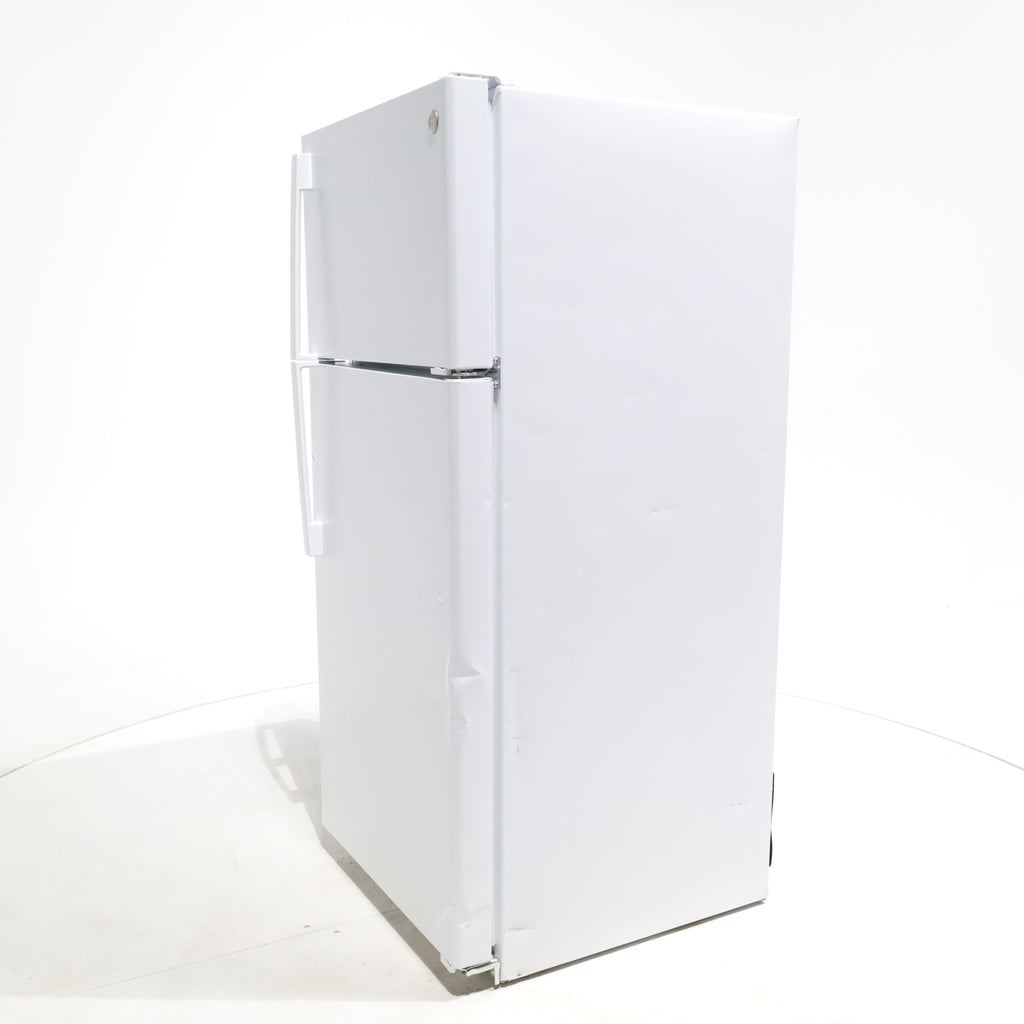 Pictures of White GE 16.6 Top Freezer Refrigerator with Reversible Hinges - Scratch & Dent - Moderate - Neu Appliance Outlet - Discount Appliance Outlet in Austin, Tx