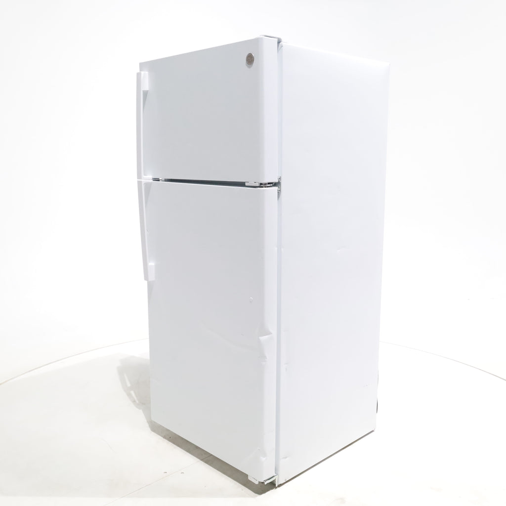 Pictures of White GE 16.6 Top Freezer Refrigerator with Reversible Hinges - Scratch & Dent - Moderate - Neu Appliance Outlet - Discount Appliance Outlet in Austin, Tx