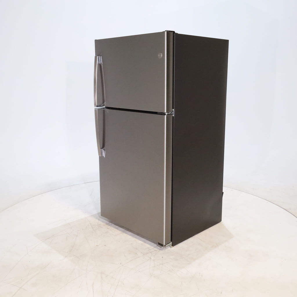 Pictures of Fingerprint Stainless Steel GE 21.9 cu. ft. Top Freezer Refrigerator with Garage Ready Technology - Scratch & Dent - Minor - Neu Appliance Outlet - Discount Appliance Outlet in Austin, Tx