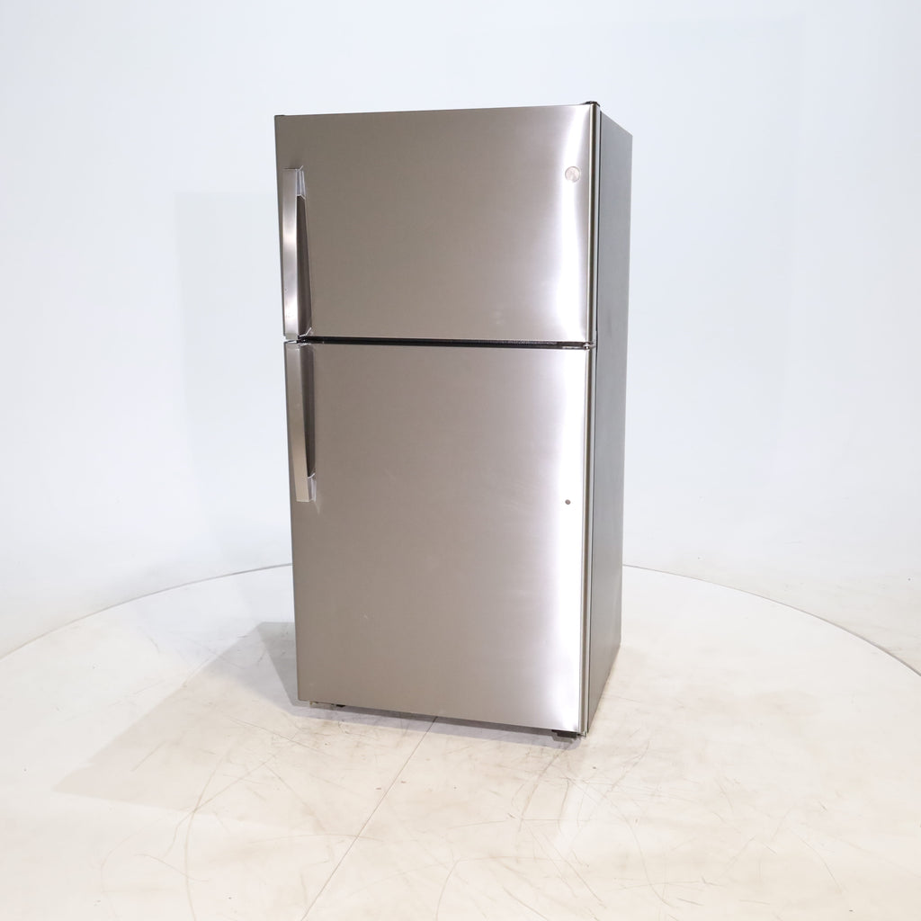 Pictures of Fingerprint Stainless Steel GE 21.9 cu. ft. Top Freezer Refrigerator with Garage Ready Technology - Scratch & Dent - Minor - Neu Appliance Outlet - Discount Appliance Outlet in Austin, Tx