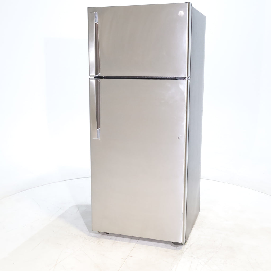 Pictures of 28" Wide Stainless Steel ENERGY STAR GE 17.5 cu. ft. Top Freezer Refrigerator with Reversible Door - Scratch & Dent - Minor - Neu Appliance Outlet - Discount Appliance Outlet in Austin, Tx