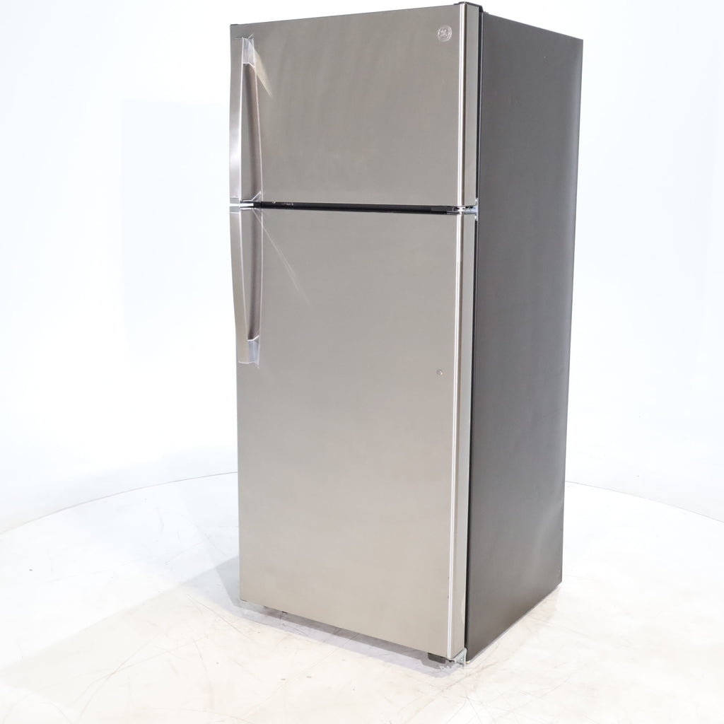 Pictures of 28" Wide Stainless Steel ENERGY STAR GE 17.5 cu. ft. Top Freezer Refrigerator with Reversible Door - Scratch & Dent - Minor - Neu Appliance Outlet - Discount Appliance Outlet in Austin, Tx