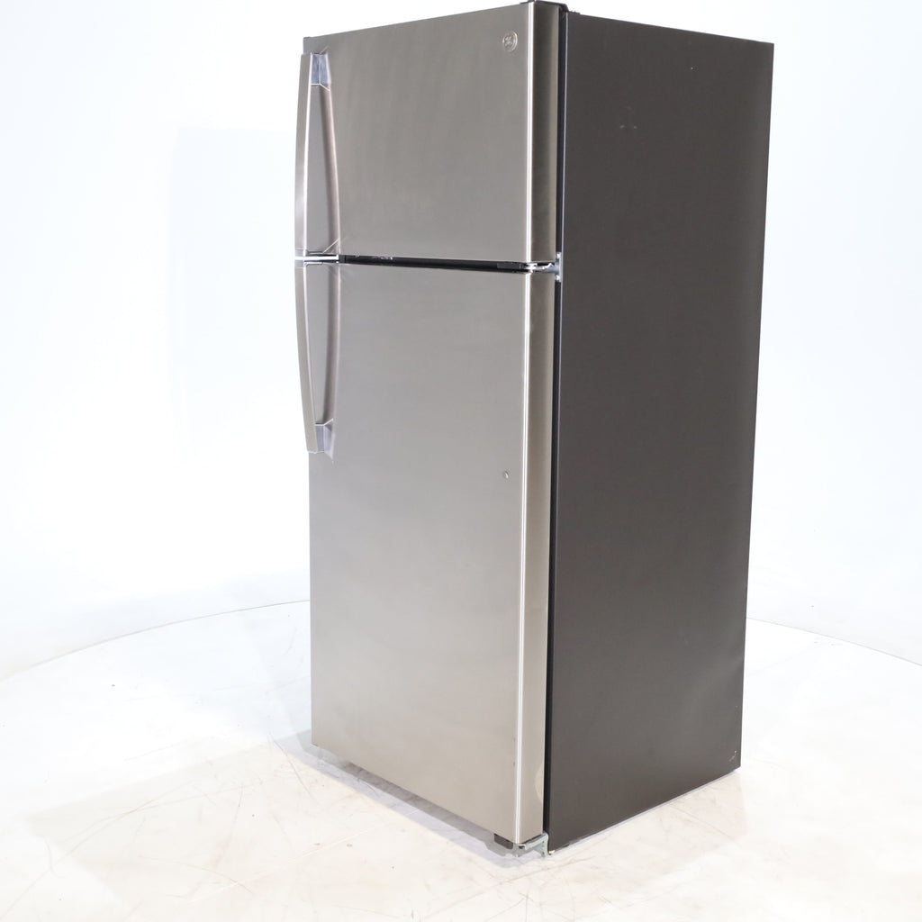 Pictures of 28" Wide Stainless Steel ENERGY STAR GE 17.5 cu. ft. Top Freezer Refrigerator with Reversible Door - Scratch & Dent - Minor - Neu Appliance Outlet - Discount Appliance Outlet in Austin, Tx