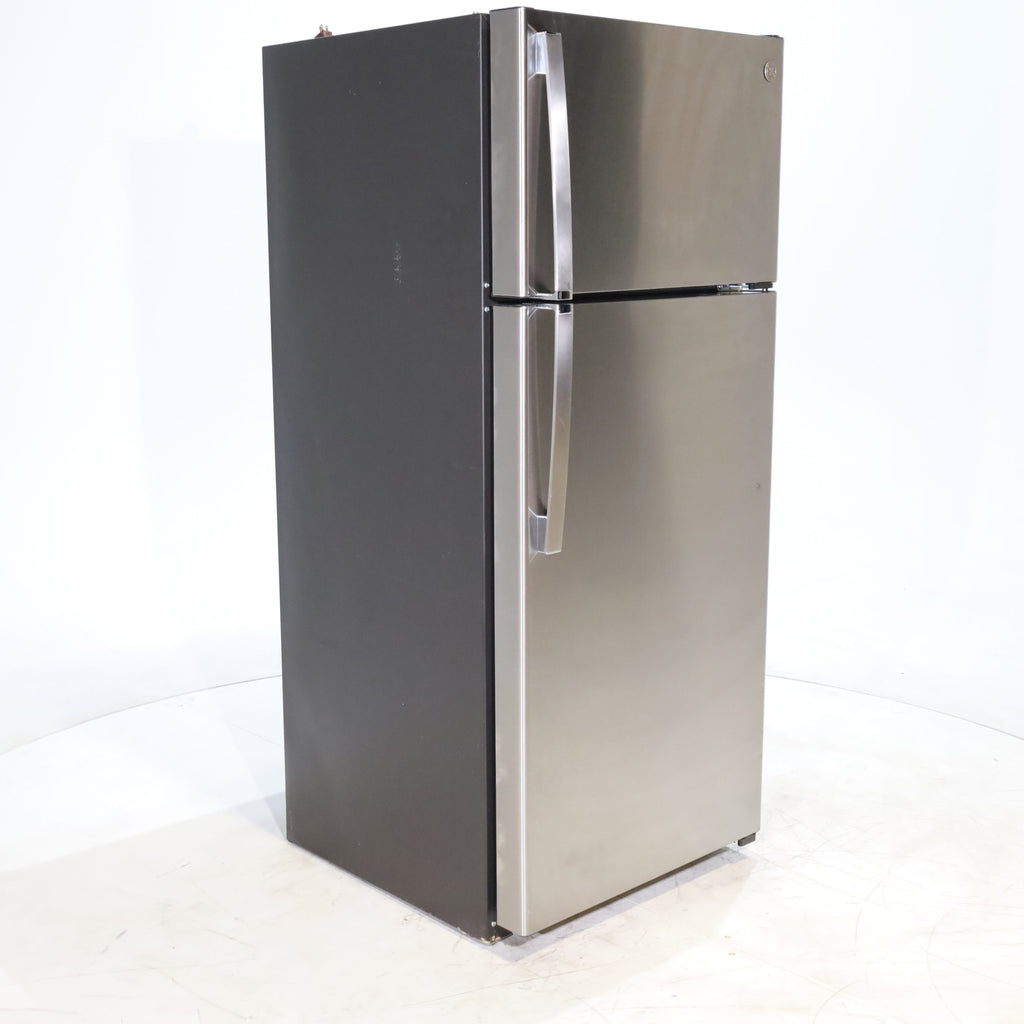 Pictures of 28" Wide Stainless Steel ENERGY STAR GE 17.5 cu. ft. Top Freezer Refrigerator with Reversible Door - Scratch & Dent - Minor - Neu Appliance Outlet - Discount Appliance Outlet in Austin, Tx