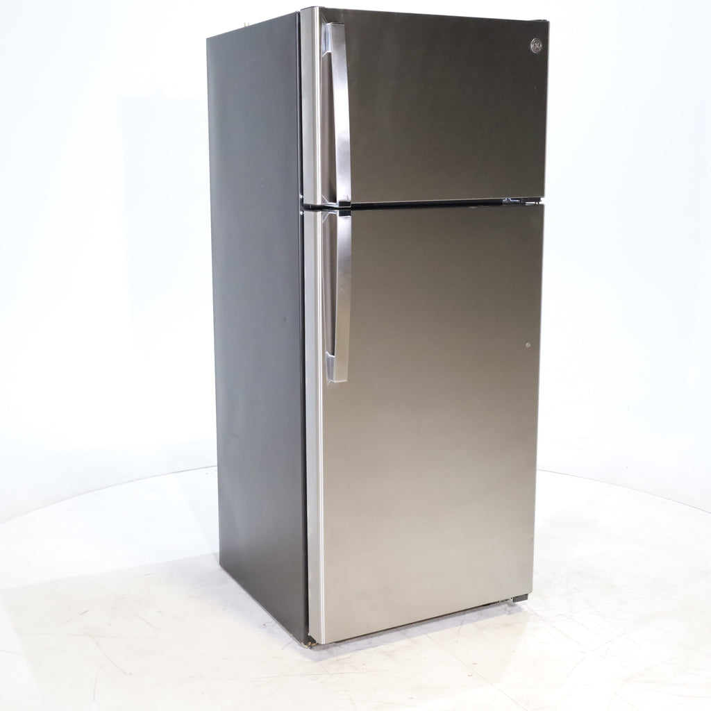 Pictures of 28" Wide Stainless Steel ENERGY STAR GE 17.5 cu. ft. Top Freezer Refrigerator with Reversible Door - Scratch & Dent - Minor - Neu Appliance Outlet - Discount Appliance Outlet in Austin, Tx