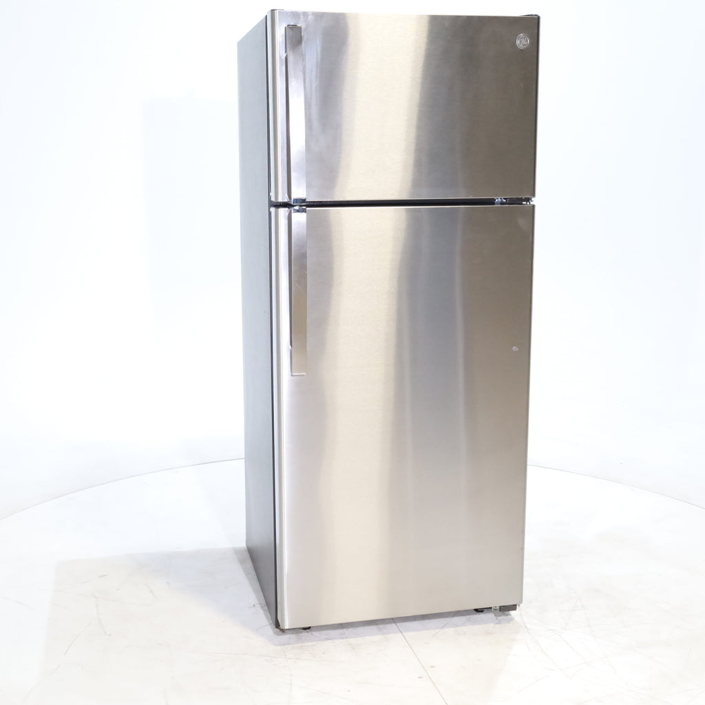 Pictures of 28" Wide Stainless Steel ENERGY STAR GE 17.5 cu. ft. Top Freezer Refrigerator with Reversible Door - Scratch & Dent - Minor - Neu Appliance Outlet - Discount Appliance Outlet in Austin, Tx