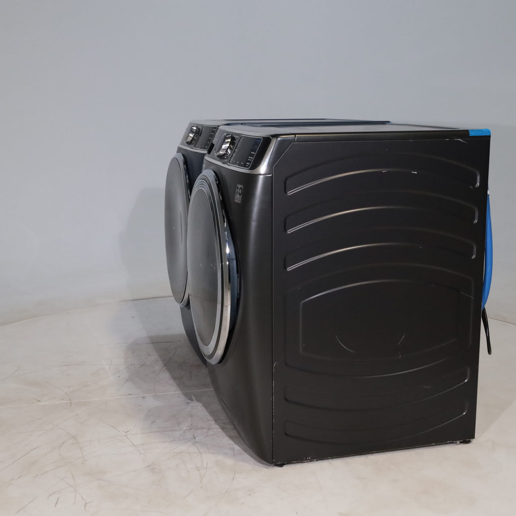 Pictures of Carbon Graphite ENERGY STAR GE 5.3 cu. ft. Frontload Washer with Steam and Sapphire Blue 7.8 cu. ft. Smart Front Load Electric Dryer with PowerSteam - Scratch & Dent - Moderate - Neu Appliance Outlet - Discount Appliance Outlet in Austin, Tx