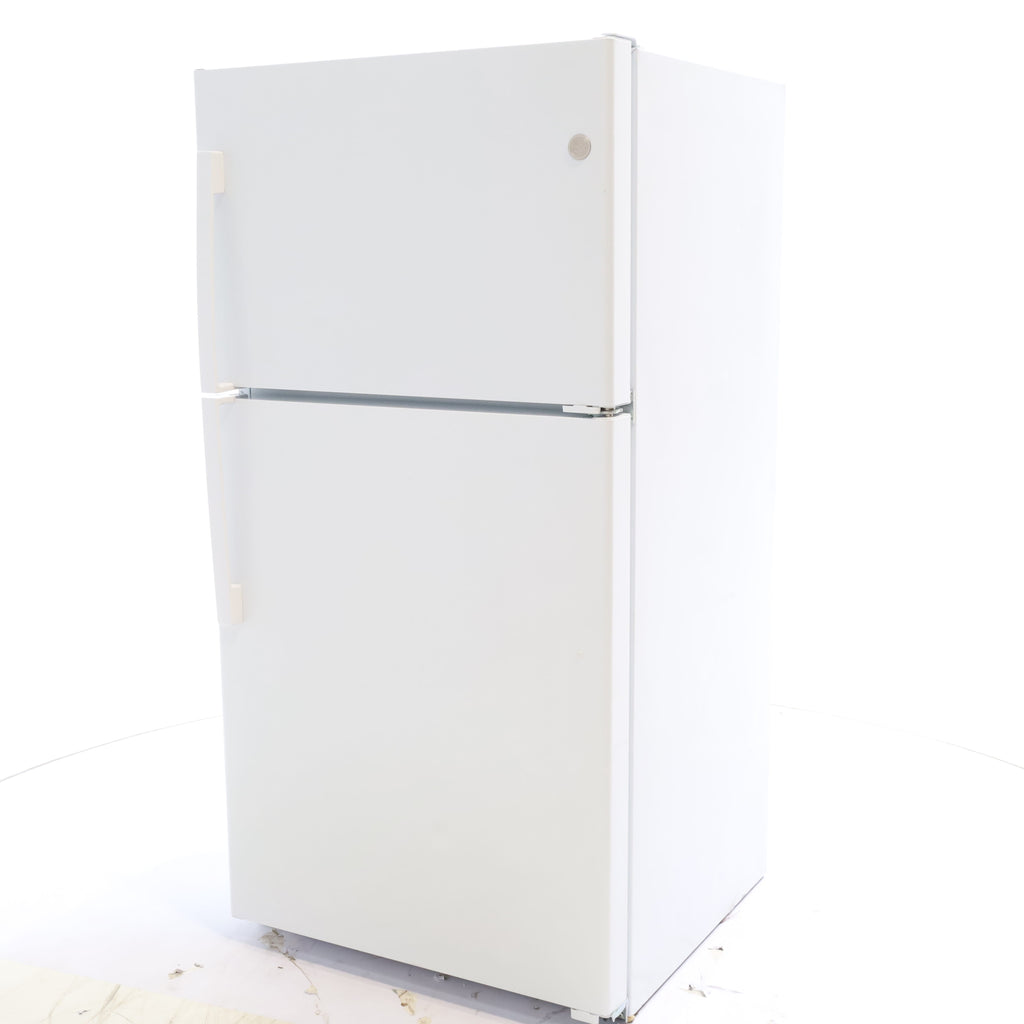 Pictures of 33" Wide GE® White 21.9 Cu. Ft. Garage Ready Top-Freezer Refrigerator - Scratch & Dent - Minor - Neu Appliance Outlet - Discount Appliance Outlet in Austin, Tx