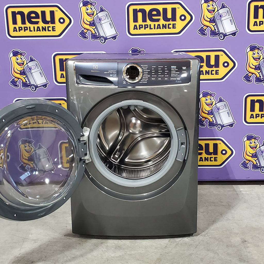 Electrolux Titanium Front Load 600 Series 4.5 Cu. Ft. Washer with Smartboost ELFW7637AT - Scratch & Dent (Minor) and Electrolux 8 cu. ft. vented Front Load Stackable 600 Series Electric Dryer with LuxCare Dry 16098 - ELFE7637AT - Scratch & Dent (Moderate)