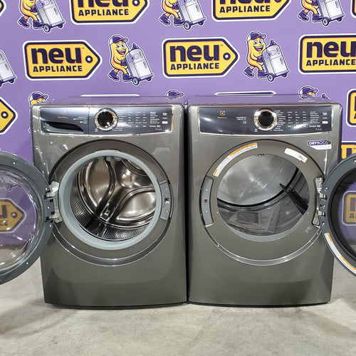 Electrolux Titanium Front Load 600 Series 4.5 Cu. Ft. Washer with Smartboost ELFW7637AT - Scratch & Dent (Minor) and Electrolux 8 cu. ft. vented Front Load Stackable 600 Series Electric Dryer with LuxCare Dry 16098 - ELFE7637AT - Scratch & Dent (Moderate)
