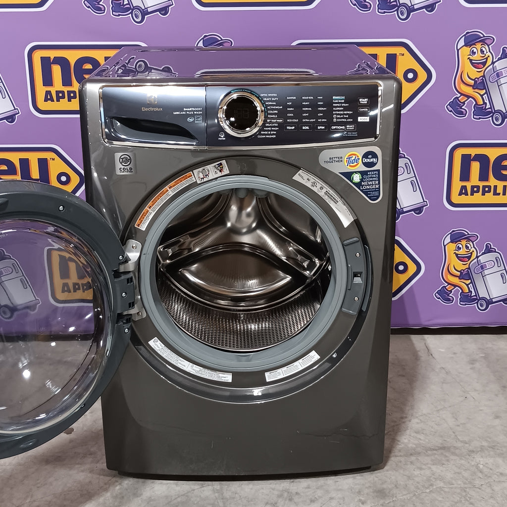 Pictures of Electrolux Titanium Front Load 600 Series 4.5 Cu. Ft. Washer with Smartboost ELFW7637AT - Scratch & Dent (Moderate) and Electrolux 8 cu. ft. vented Front Load Stackable 600 Series Electric Dryer with LuxCare Dry 16248 - ELFE7637AT - Scratch & Dent (Minor) - Neu Appliance Outlet - Discount Appliance Outlet in Austin, Tx