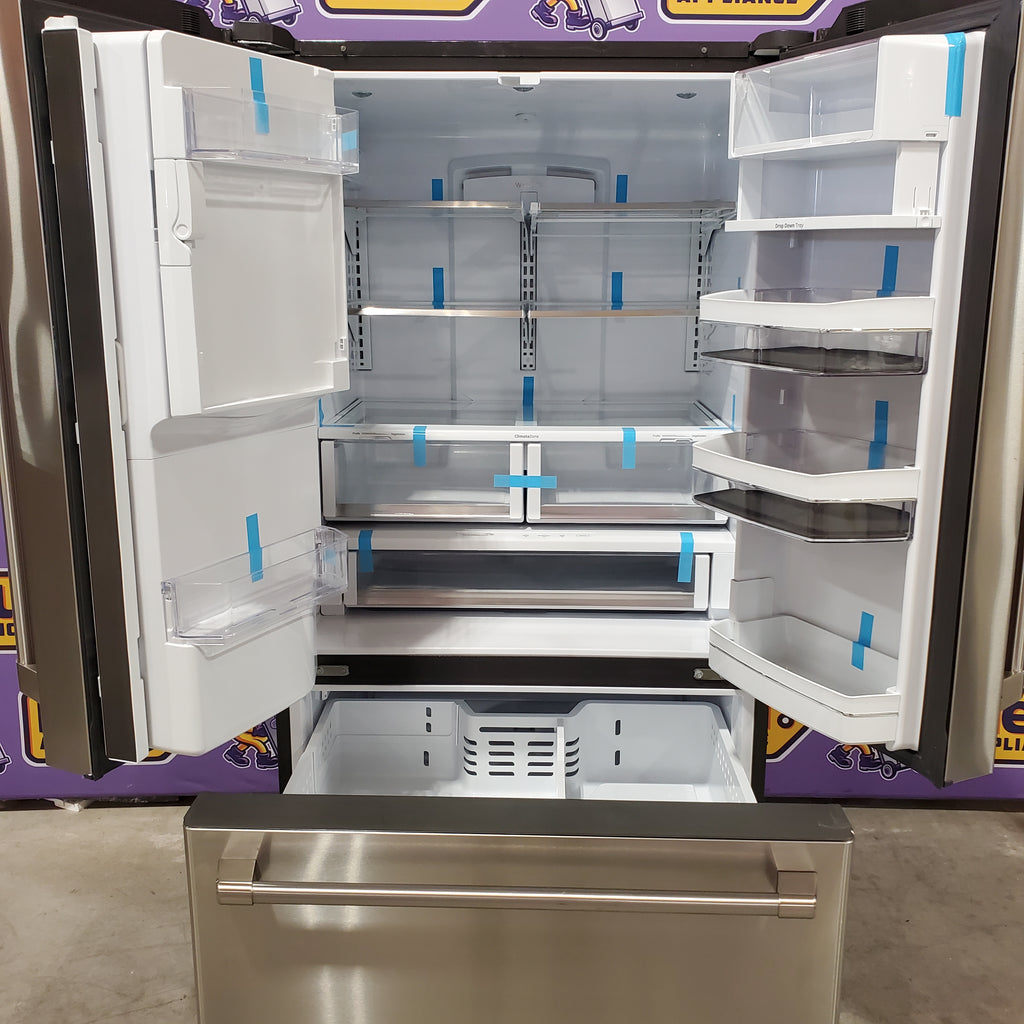 GE Cafe 27.8-cu ft French Door Refrigerator with Ice Maker, Water and Ice Dispenser ENERGY STAR in Stainless Steel 31131SD21 - CFE28TSHSS - Scratch & Dent (Minor)