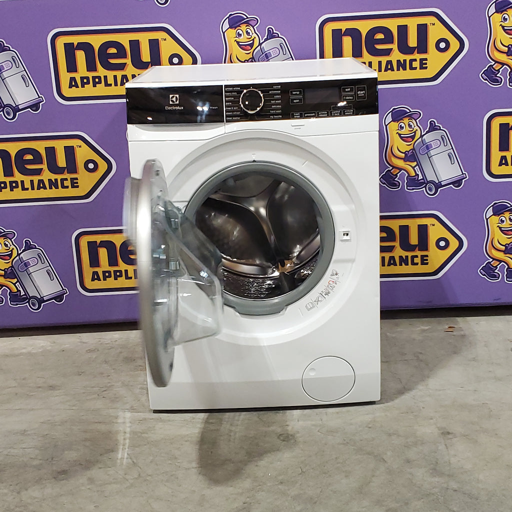 Electrolux 24" Wide Compact Front Load 2.4 cu ft Washer with LuxCare Wash System and Steam Refresh Cycle ELFW4222AW - Scratch & Dent (Minor) and Electrolux 24" 4.0 cu. ft. Compact Electric Dryer 15033 - ELFE4222AW - Scratch & Dent (Minor)
