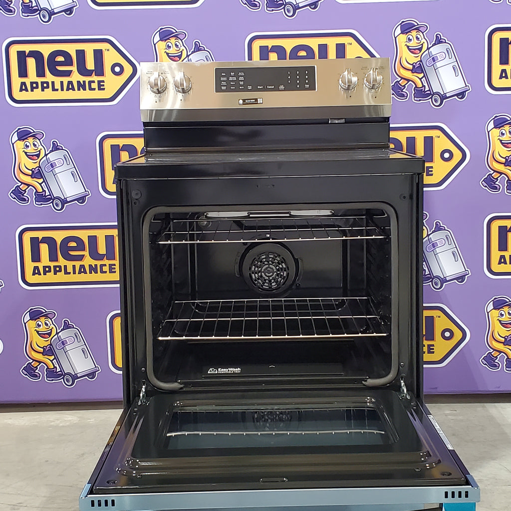Pictures of GE ENERGY STAR® 30" Free-Standing Electric Convection Range with No Preheat Air Fry and EasyWash™ Oven Tray GRF600AVSS - New in Box - Neu Appliance Outlet - Discount Appliance Outlet in Austin, Tx