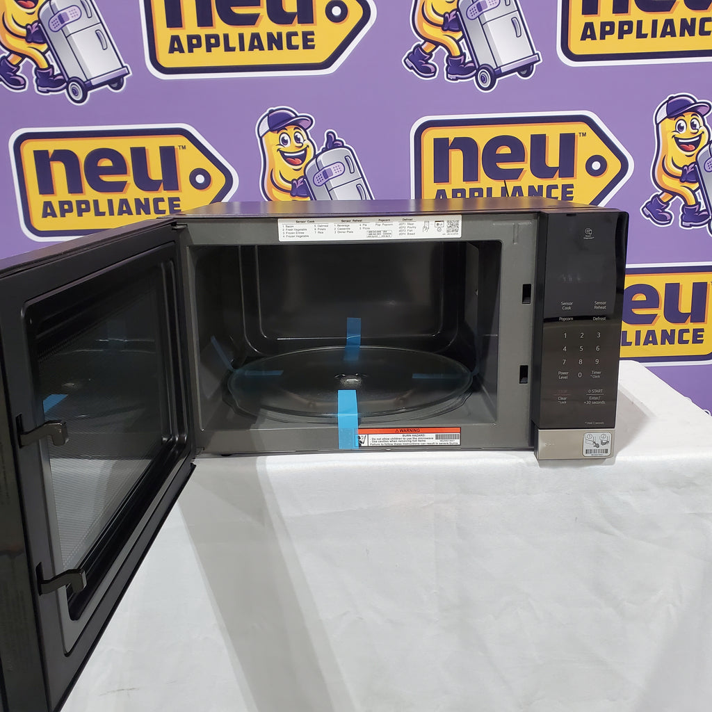Pictures of LG 1.5 cu. ft. NeoChef™ Countertop Microwave with Smart Inverter and Sensor Cooking 17SD207 - MSER1590S - Scratch & Dent (Minor) - Neu Appliance Outlet - Discount Appliance Outlet in Austin, Tx