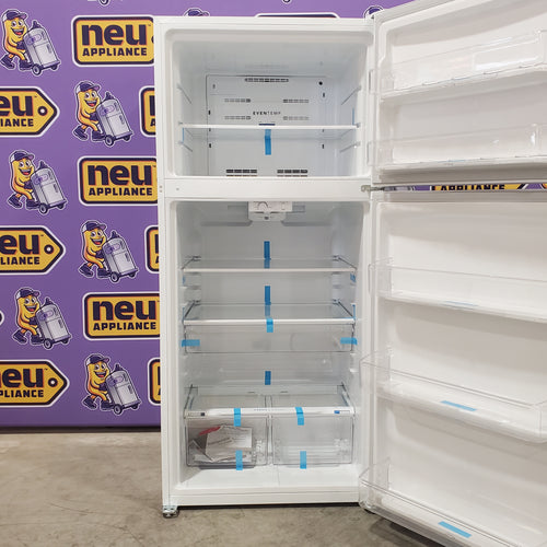 Frigidaire 20 Cu. Ft. Garage Ready Top Freezer Refrigerator in White With Ice Maker Installed FFTR2045VW - Scratch & Dent (Minor)