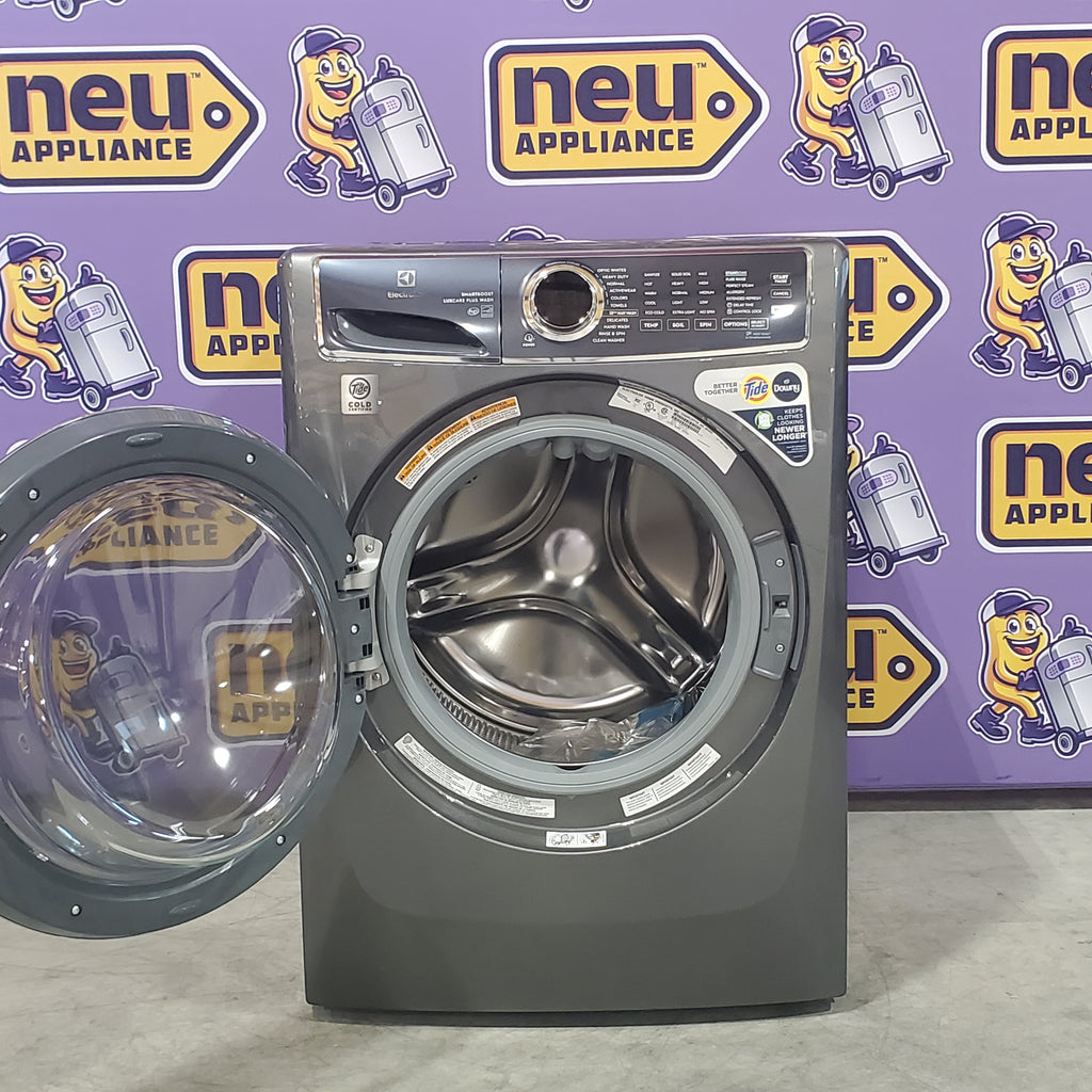 Pictures of Electrolux Titanium Front Load 600 Series 4.5 Cu. Ft. Washer with Smartboost ELFW7637AT - Scratch & Dent (Minor) and Electrolux 8 cu. ft. vented Front Load Stackable 600 Series Electric Dryer in Titanium with LuxCare Dry 16032 - ELFE7637AT - New in Box - Neu Appliance Outlet - Discount Appliance Outlet in Austin, Tx