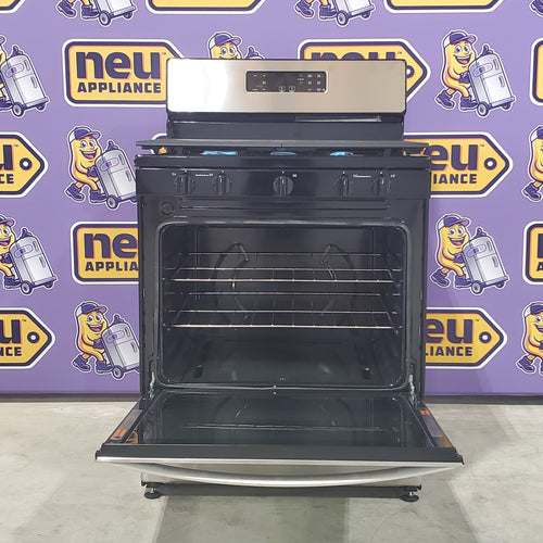 Whirlpool 5.1 Cu. Ft. Freestanding Gas Range with Edge to Edge Cooktop WFG505M0MS - Scratch and Dent (Minor)