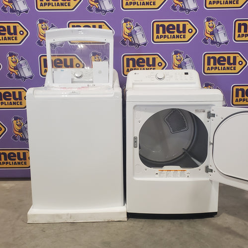 LG White Top Load 4.5 Cu. Ft. Washer with NeveRust Drum and TurboDrum Technology WT7000CW - New in Box and LG 7.3 cu. ft. Ultra Large High Efficiency Electric Dryer in White 16067 - DLE7000W - Scratch & Dent (Minor)