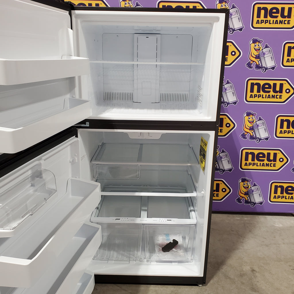 Pictures of GE® ENERGY STAR® 21.1 Cu. Ft. Top-Freezer Refrigerator 31133SD127 - GTE21GSHSS - Scratch & Dent (Major) - Neu Appliance Outlet - Discount Appliance Outlet in Austin, Tx