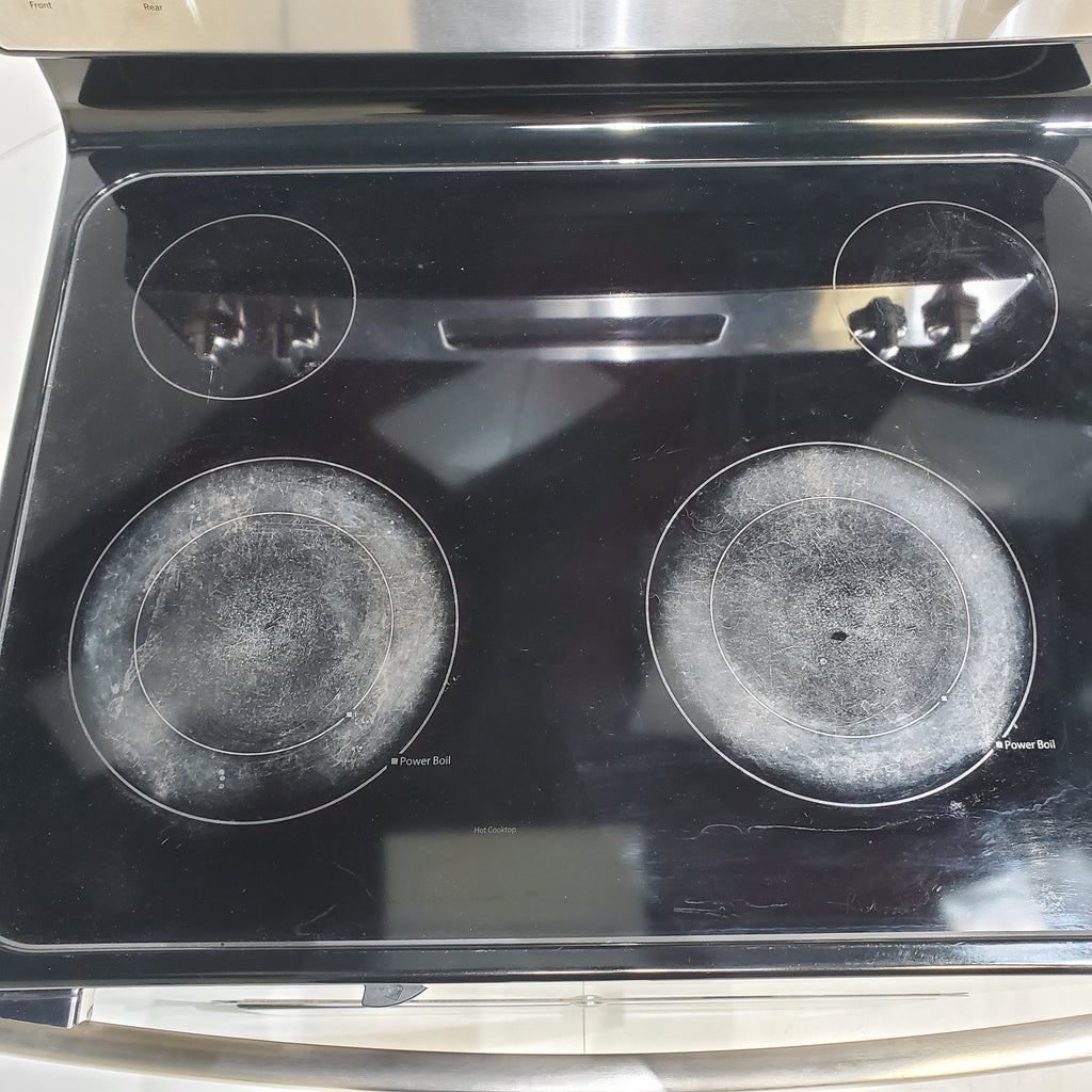 Pictures of Stainless Steel GE 5.3 cu. ft. Freestanding 4 Heating Element Smooth Cooktop Electric Range with Dual Element Baking - Certified Refurbished - Neu Appliance Outlet - Discount Appliance Outlet in Austin, Tx