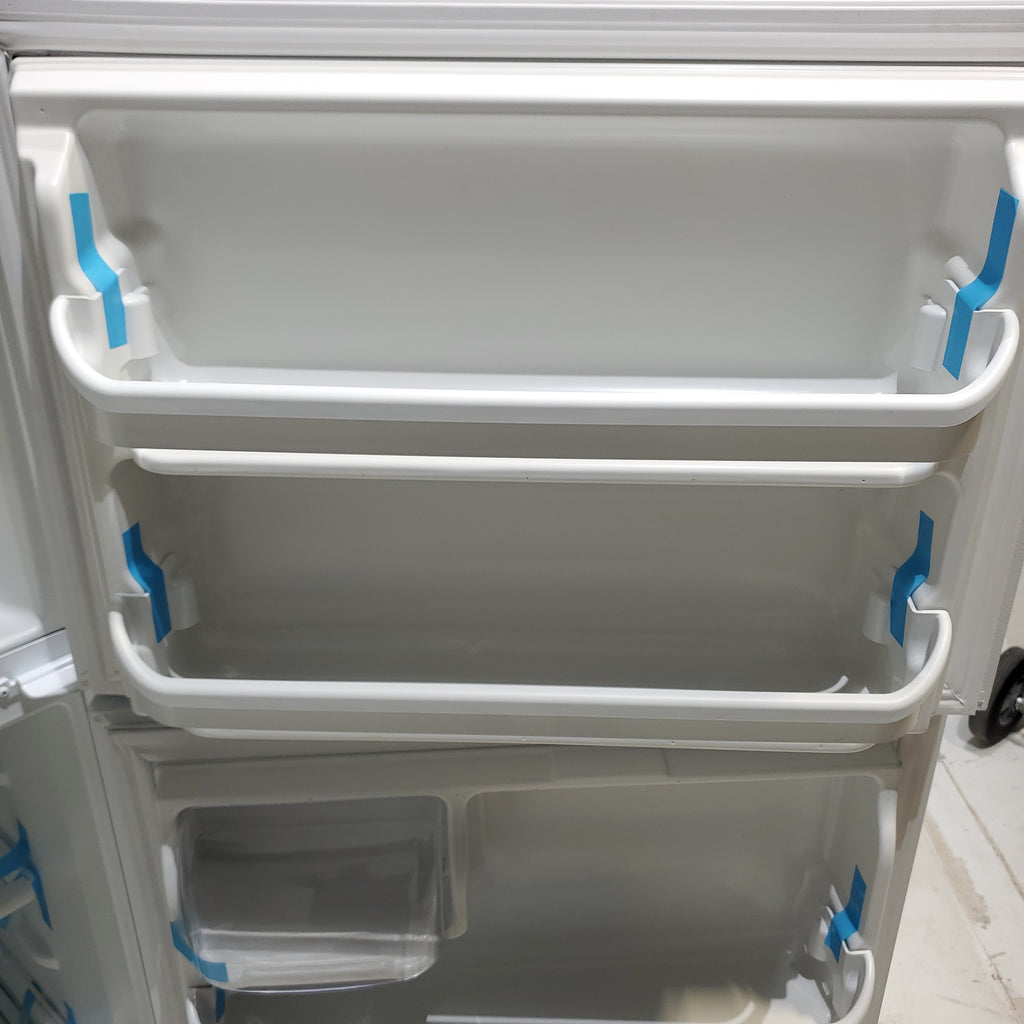 Pictures of 30 in. Wide White Frigidaire 20.4 cu. ft. Top Freezer Refrigerator with Reversible Doors - Certified Refurbished - Neu Appliance Outlet - Discount Appliance Outlet in Austin, Tx