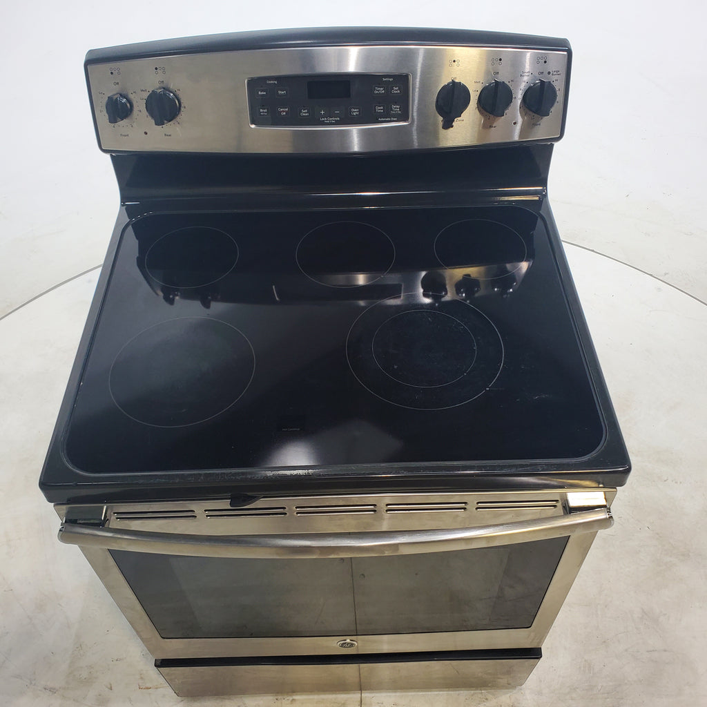 Pictures of Stainless Steel GE 5.30 cu. ft. 4 Heating Element Freestanding Electric Range with Smooth Cooktop - Certified Refurbished - Neu Appliance Outlet - Discount Appliance Outlet in Austin, Tx