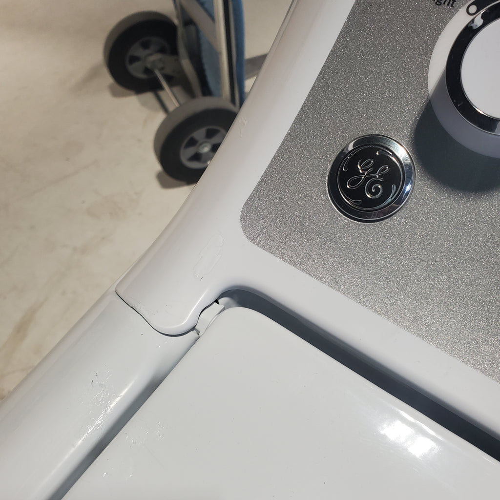 Pictures of ENERGY STAR GE  4.4 cu. ft. Top Load Washing Machine with Infusor Wash System and 7.2 cu. ft. Electric Dryer with HE Sensor Dry - Certified Refurbished - Neu Appliance Outlet - Discount Appliance Outlet in Austin, Tx