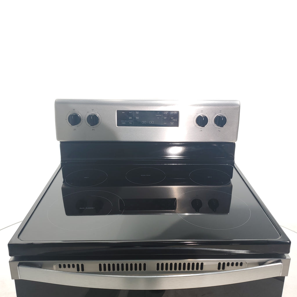 Pictures of Fingerprint Resistant Stainless Steel Whirlpool 5.3 cu. ft. Freestanding 5 Heating Element Smooth Cooktop Electric Range with Frozen Bake Technology Scratch & Dent - Minor - Neu Appliance Outlet - Discount Appliance Outlet in Austin, Tx