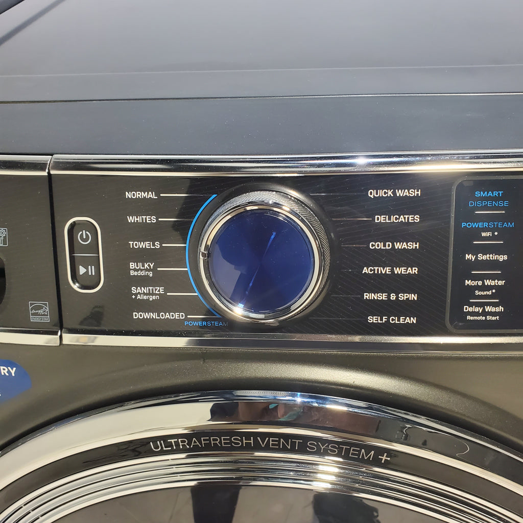 Pictures of GE Profile 5.3 cu. ft. Smart Front Load Washer in Carbon Graphite with OdorBlock UltraFresh Vent System and Steam and  GE® ENERGY STAR® 7.8 cu. ft. Capacity Smart Front Load Electric Dryer with Steam and Sanitize Cycle - Scratch and Dent - Moderate - Neu Appliance Outlet - Discount Appliance Outlet in Austin, Tx