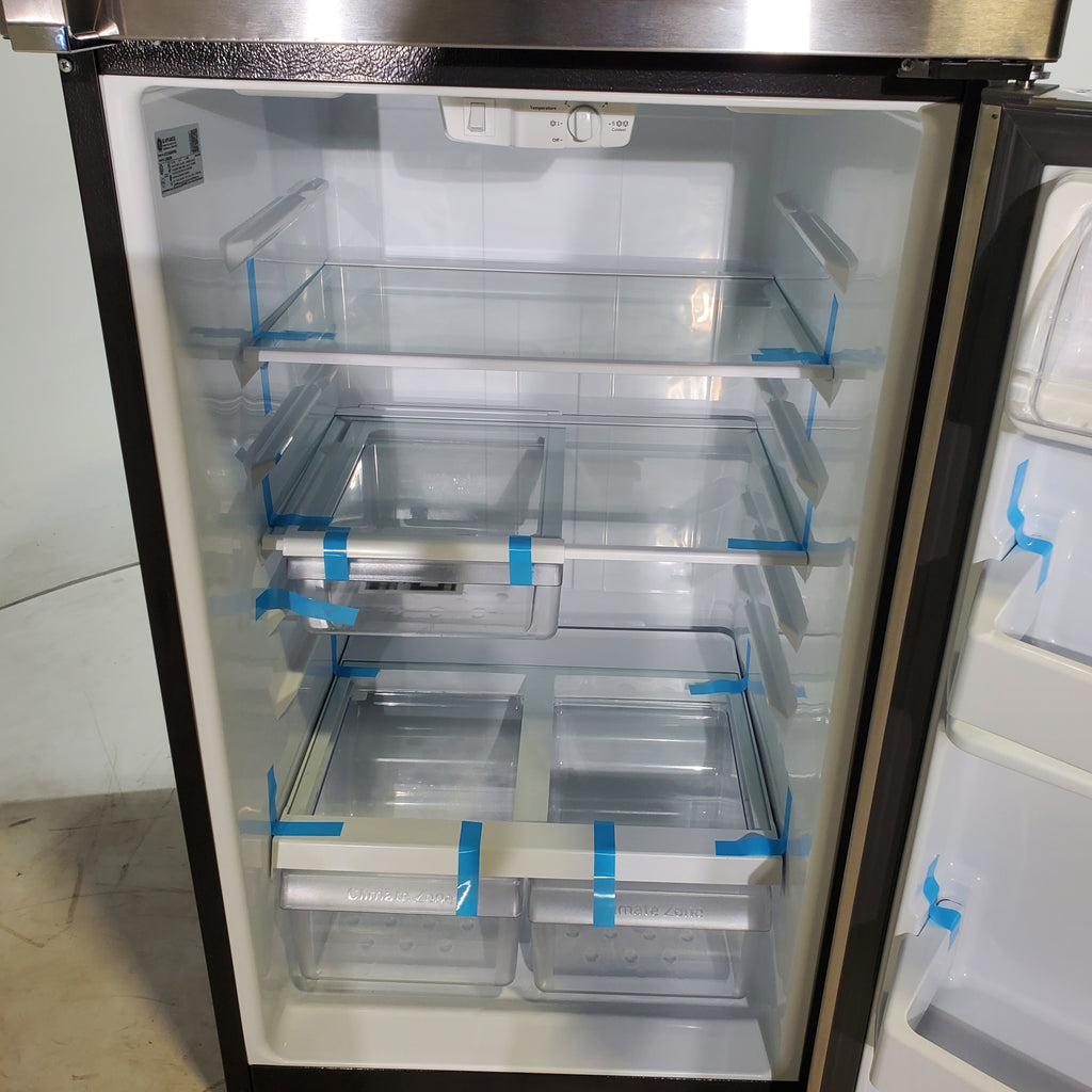 Pictures of 28" Wide Stainless Steel ENERGY STAR GE 17.5 cu. ft. Top Freezer Refrigerator with Reversible Door - Scratch & Dent - Minor - Neu Appliance Outlet - Discount Appliance Outlet in Austin, Tx