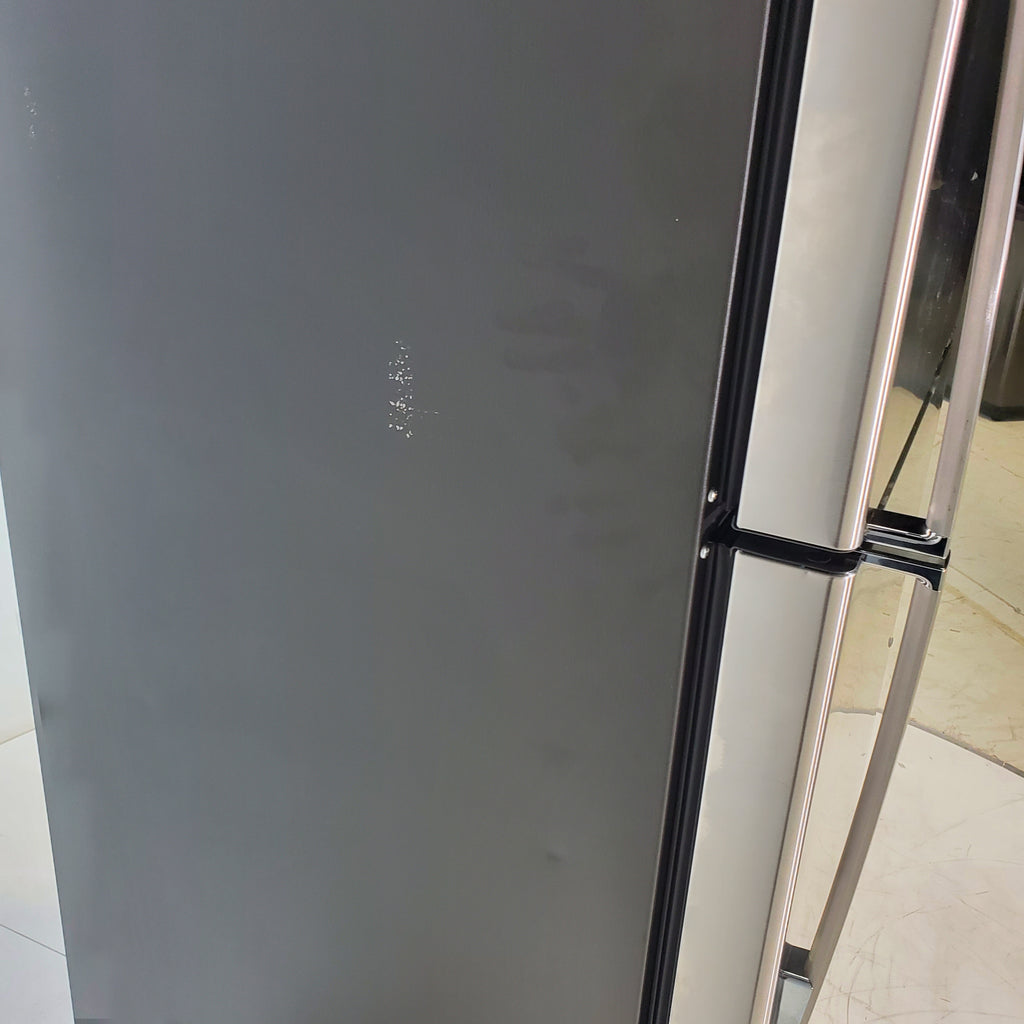 Pictures of 28" Wide Stainless Steel ENERGY STAR GE 17.5 cu. ft. Top Freezer Refrigerator with Reversible Door - Scratch & Dent - Minor - Neu Appliance Outlet - Discount Appliance Outlet in Austin, Tx