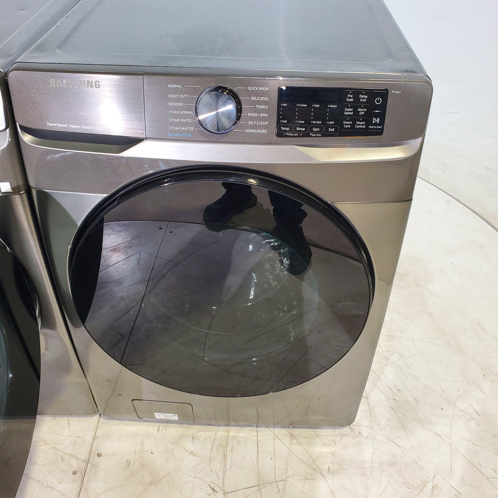 Pictures of Platinum ENERGY STAR Samsung 4.5 cu. ft. Front Load Washer with WiFi Connectivity and Platinum Samsung 7.5 cu. ft. Front Load Electric Dryer with Steam - Scratch and Dent - Minor - Neu Appliance Outlet - Discount Appliance Outlet in Austin, Tx