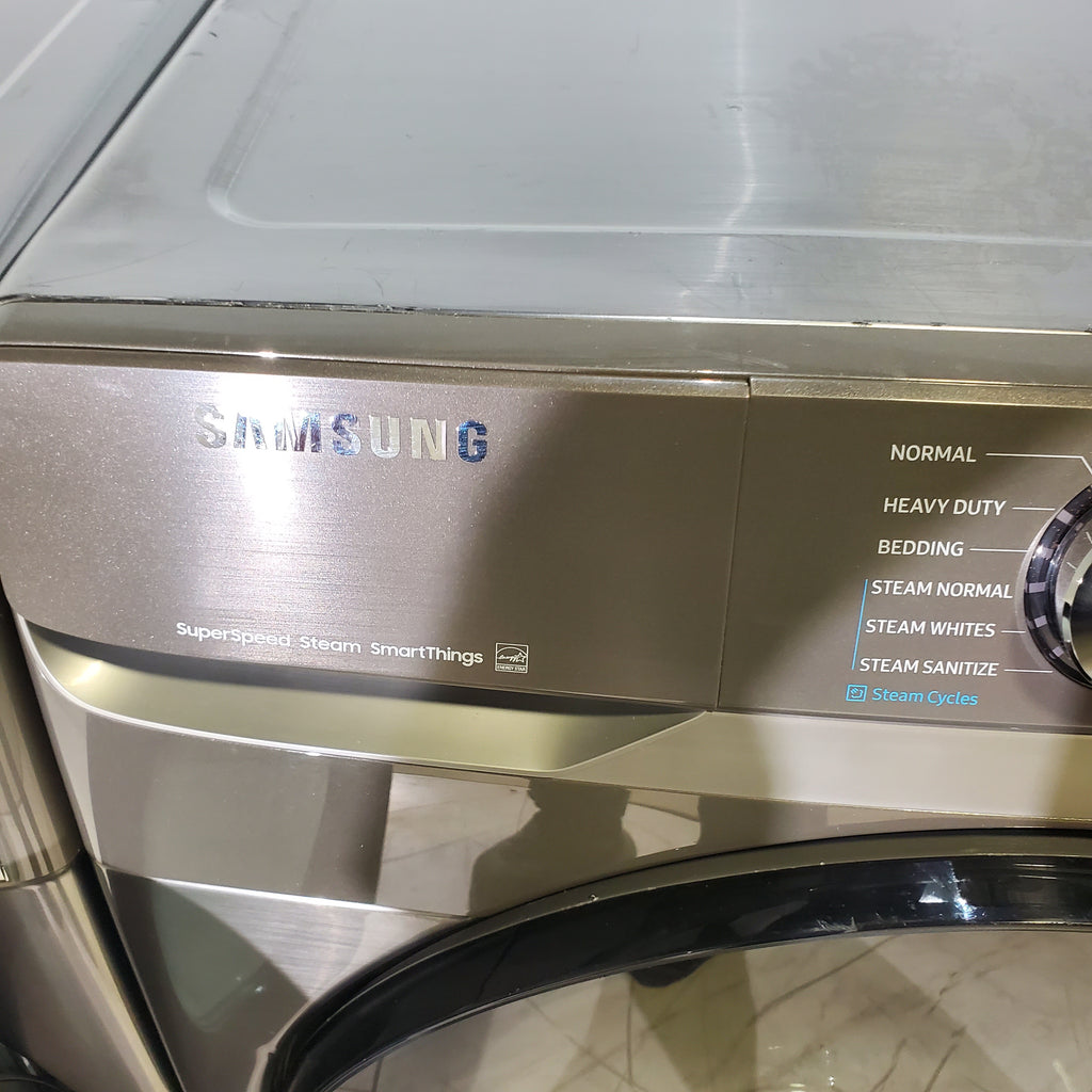 Pictures of Platinum ENERGY STAR Samsung 4.5 cu. ft. Front Load Washer with WiFi Connectivity and Platinum Samsung 7.5 cu. ft. Front Load Electric Dryer with Steam - Scratch and Dent - Minor - Neu Appliance Outlet - Discount Appliance Outlet in Austin, Tx